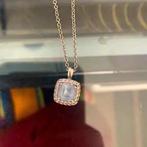 Blue Stone surround by Diamonds Necklace.